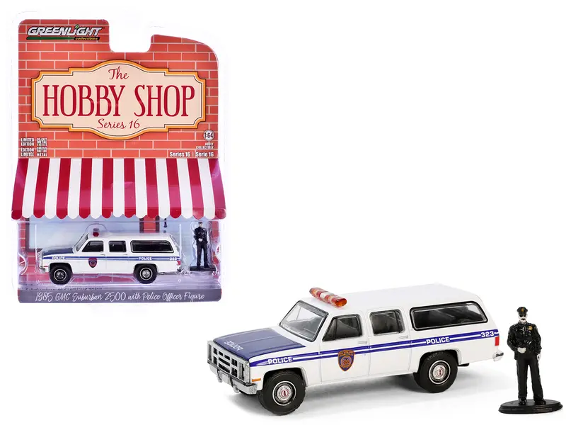 1985 Gmc Suburban 2500 "New York City Transit Police Department" White With Blue Stripes And Police Officer Figure "The Hobby Shop" Series 16 1/64 Diecast Model Car By Greenlight 1